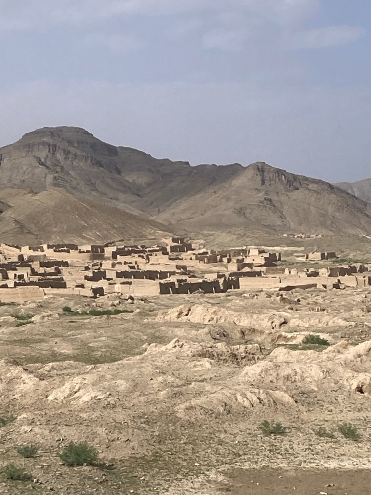 Traditional hillside village documented in mountainous Pakistan region