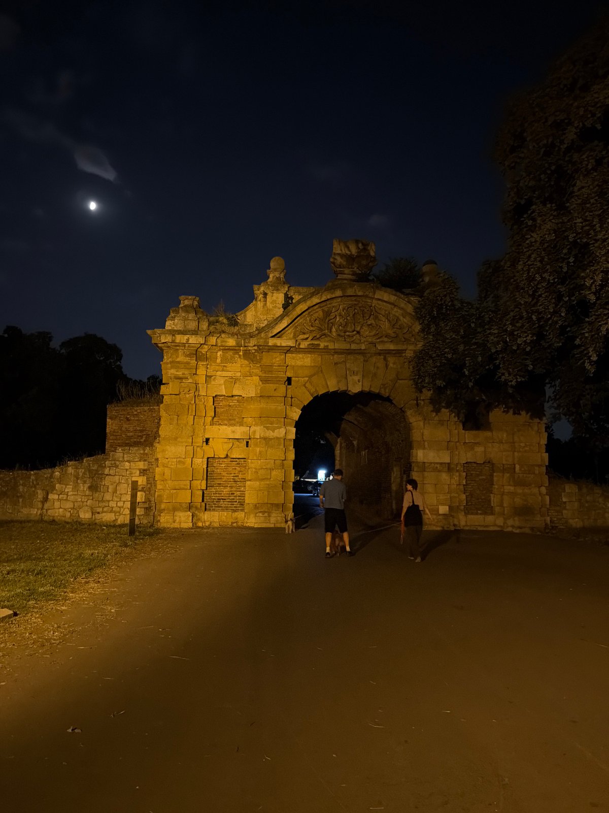 Belgrade Fortress at night, walls lit and paths quiet