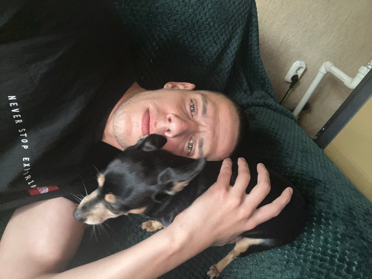 Couple enjoys quiet coffee morning with dog in Sofia