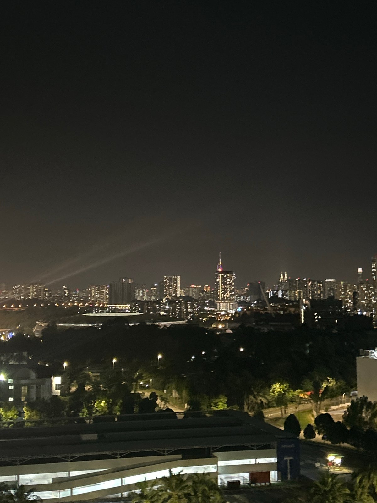 Observer Documents Kuala Lumpur Night Skyline From High Vantage Point