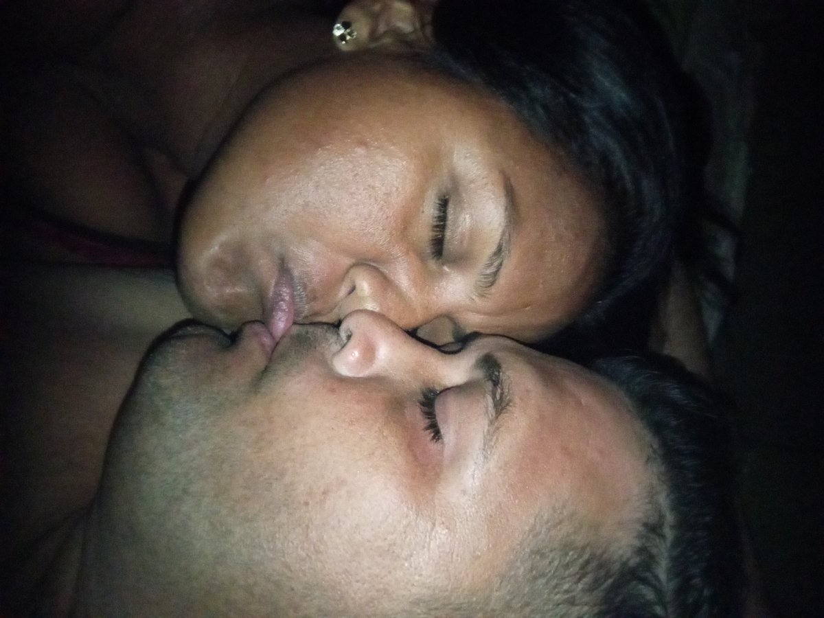 Intimate encounter between two individuals photographed in private setting