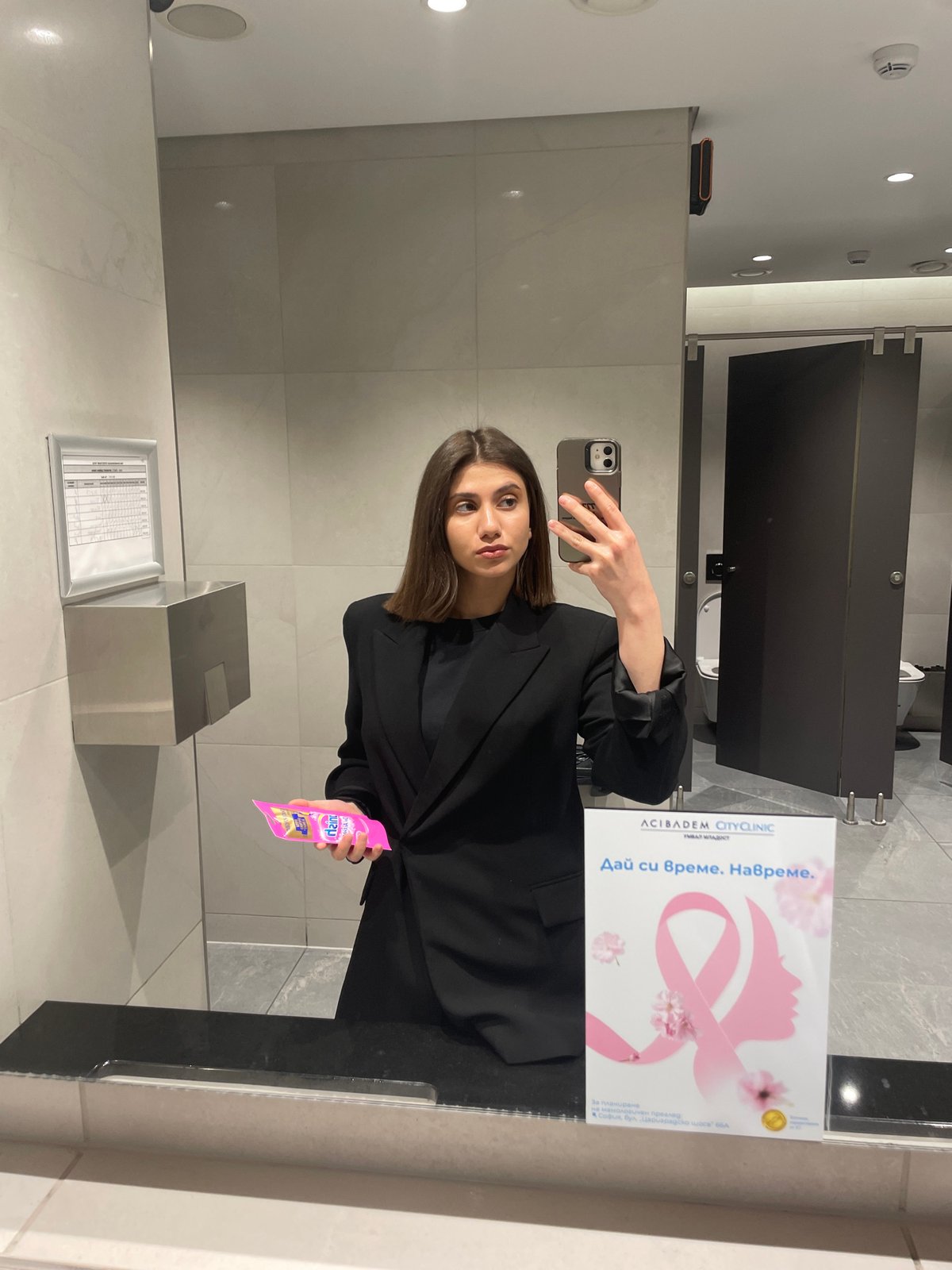 Woman Takes Selfies at Eyewear Store and Restroom in Sofia