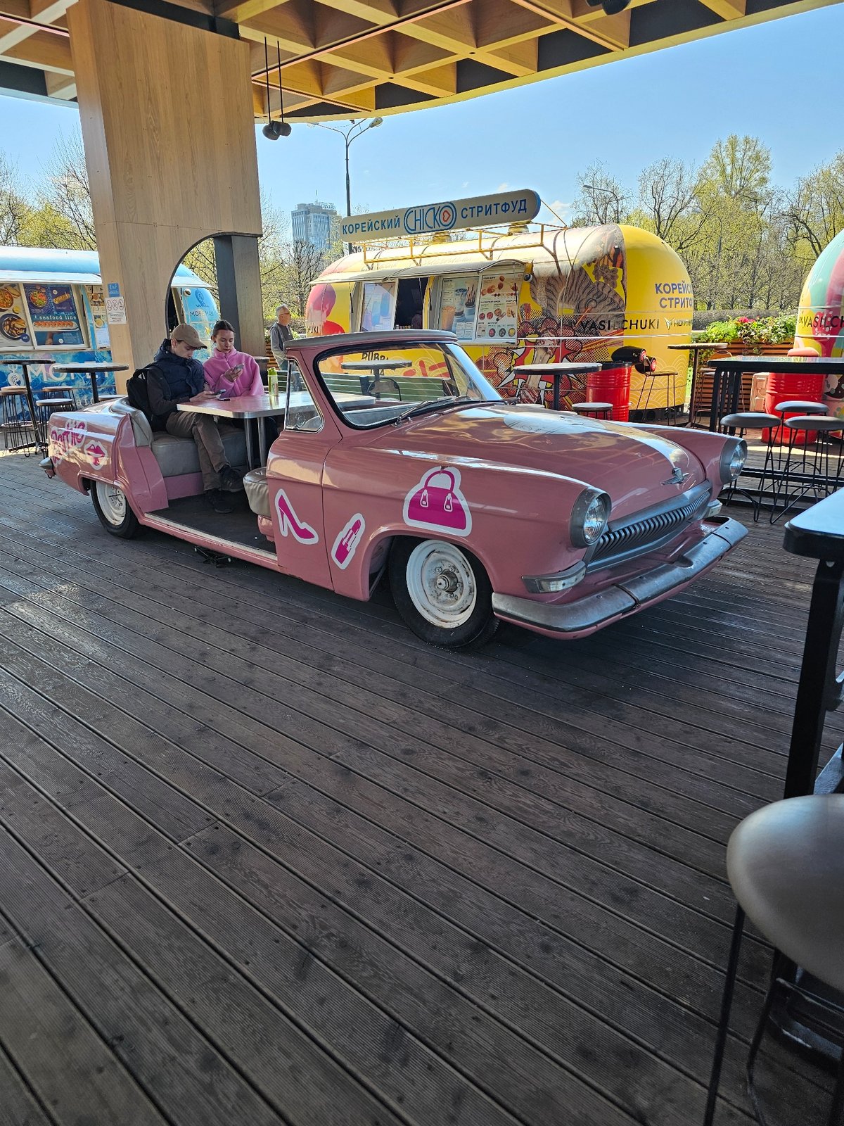 Moscow morning: vintage car restaurant, formal statue documented