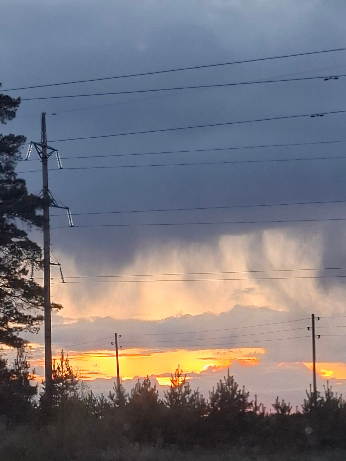 Dramatic sunset with contrasting skies observed in Гаревая, Russia