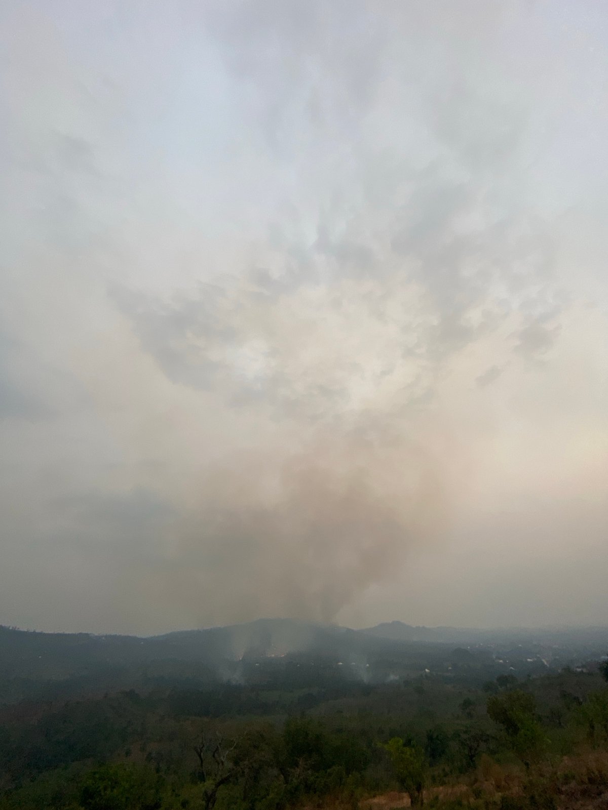 Smoke from hillside fire reduces visibility in Nigerian mountains