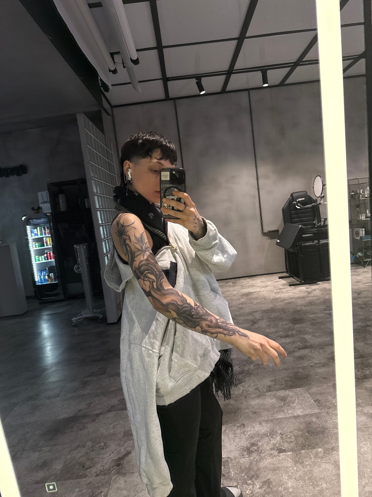 Person with piercings documented at multiple Moscow locations