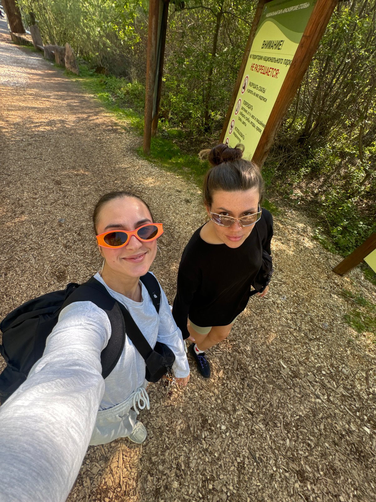 Visitor documents nature walk through Stolby National Park, Krasnoyarsk
