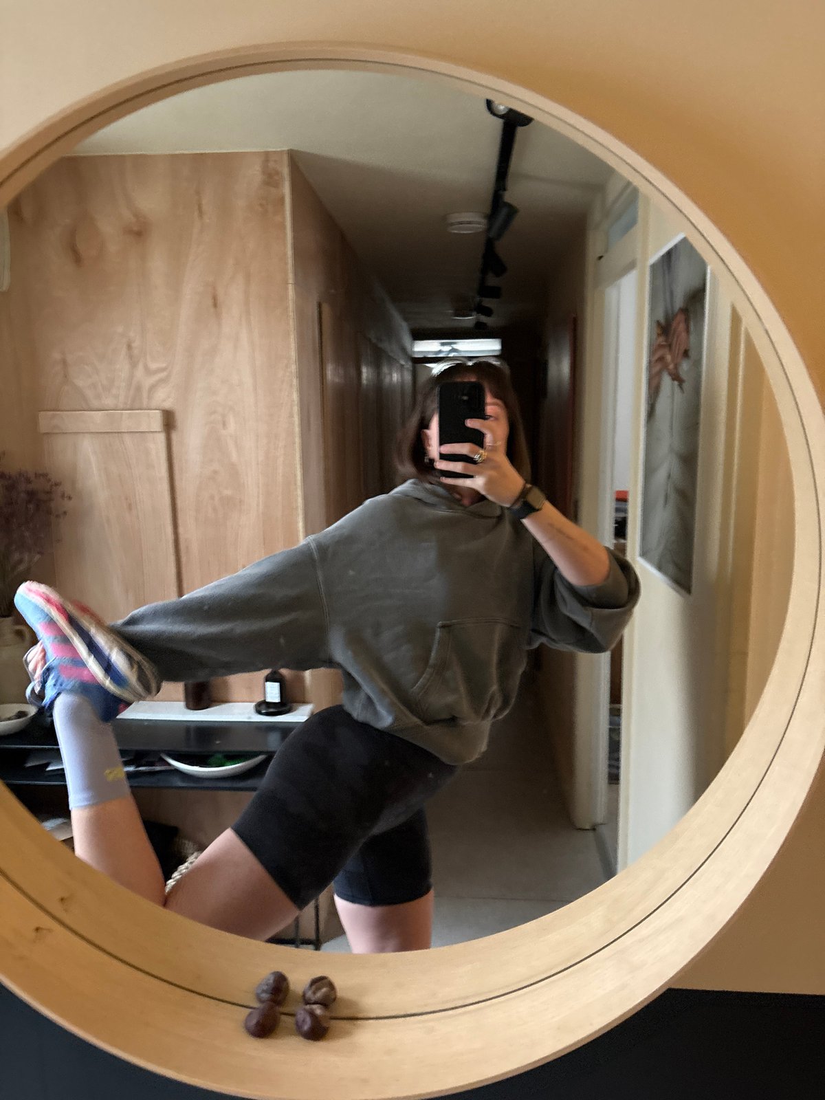 Morning mirror selfie captured in London indoor setting