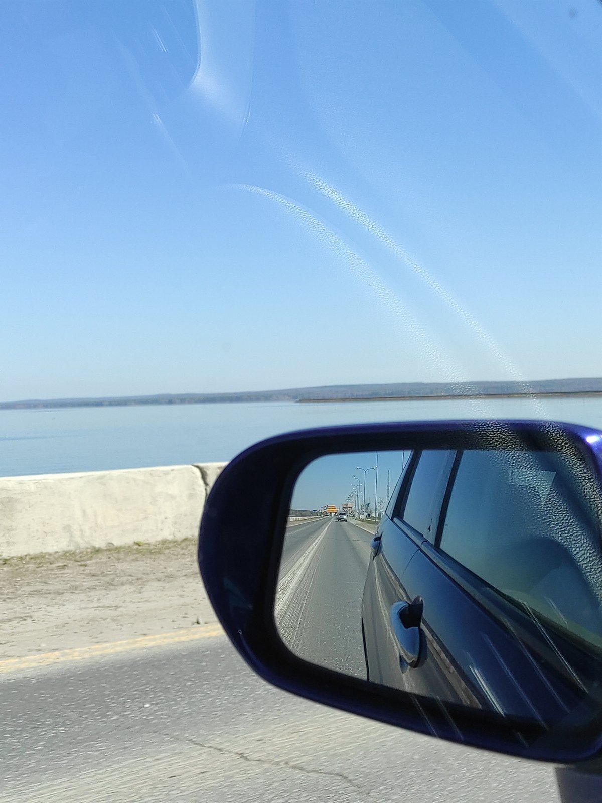 Highway travel documented from vehicle interior in Chaikovsky