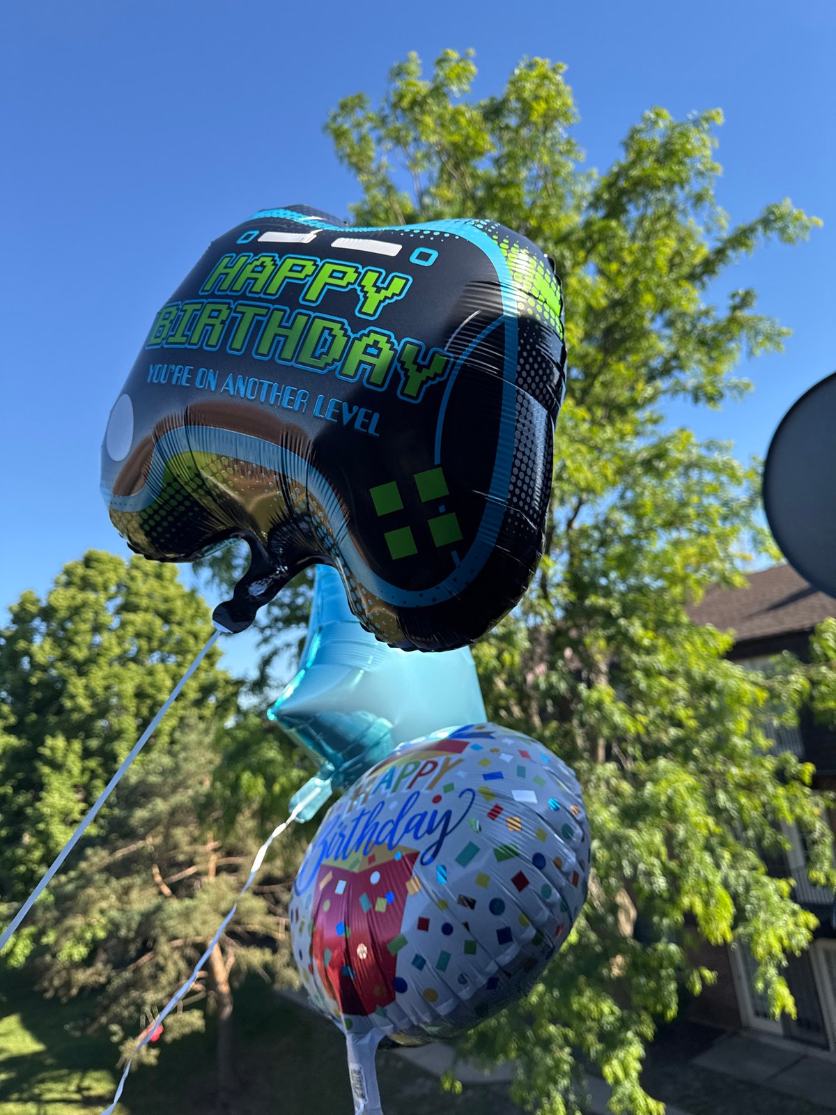 Celebratory balloons spotted in clear skies over Glendale Heights