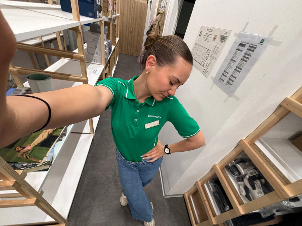 Employee takes selfies at DEICHMANN shoe store in Sofia