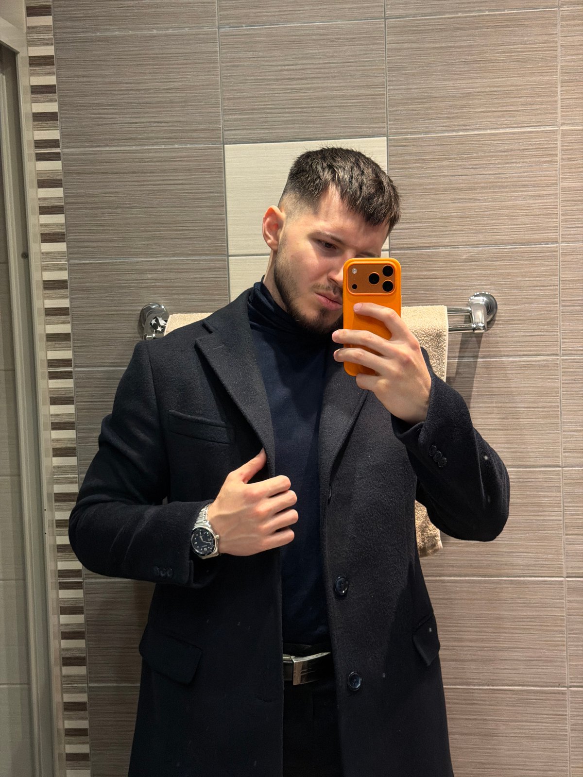Man takes multiple selfies in Sofia bathroom and elevator
