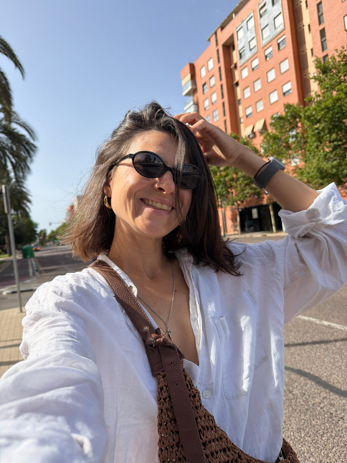 Sunny day selfies, neon art, and a palm-lined city street.