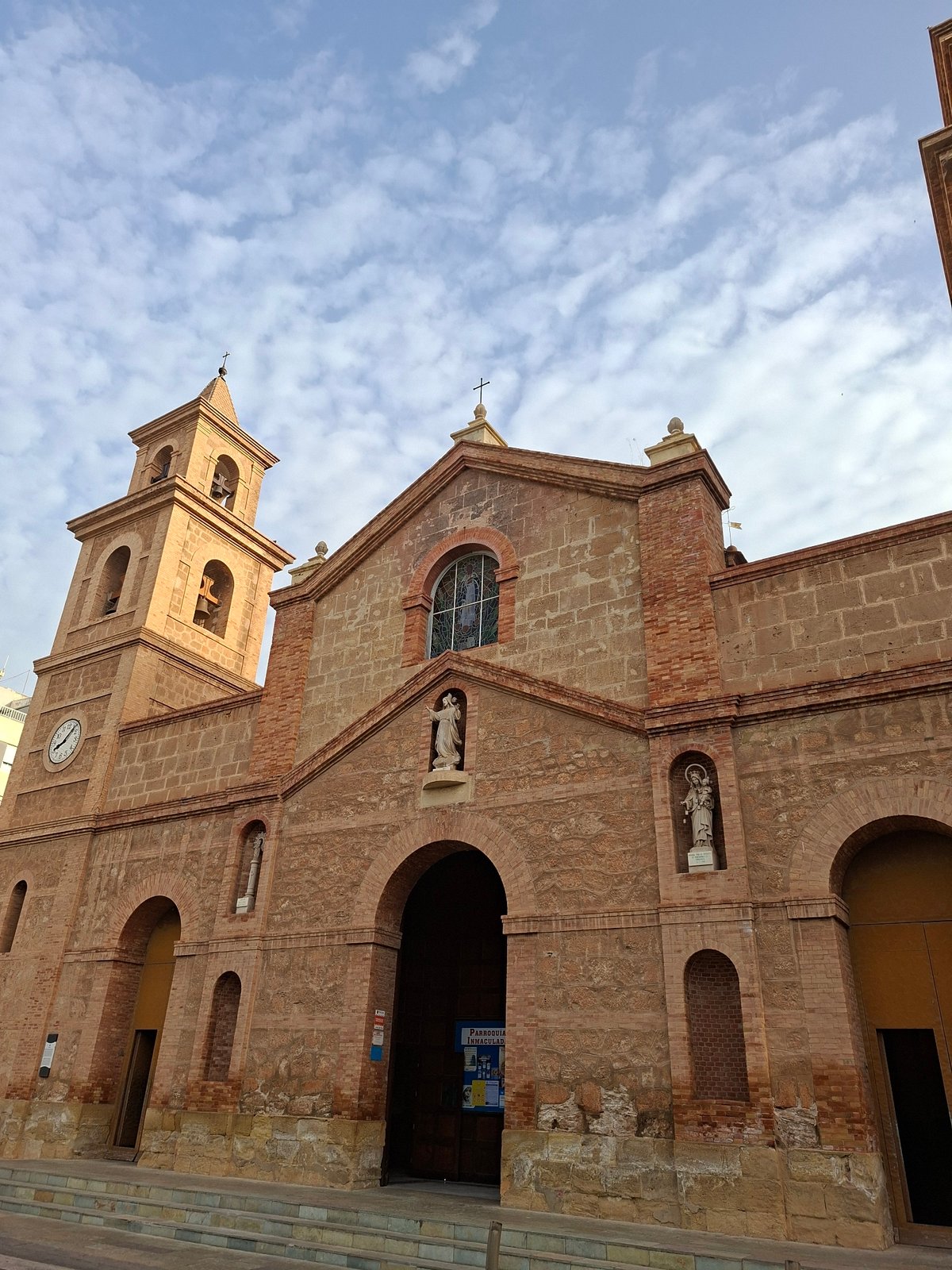 Street-level snapshots around a Torrevieja church and plaza