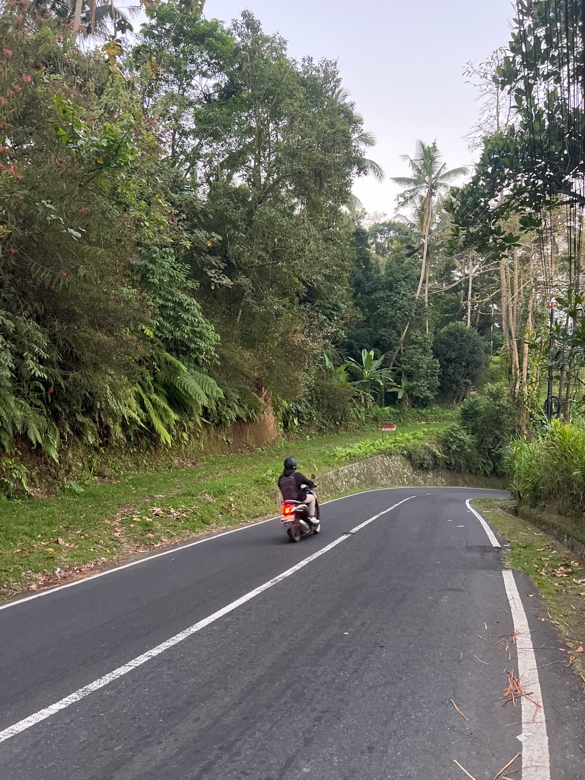Quiet roads and a Balinese roundabout shrine in Bali's highlands