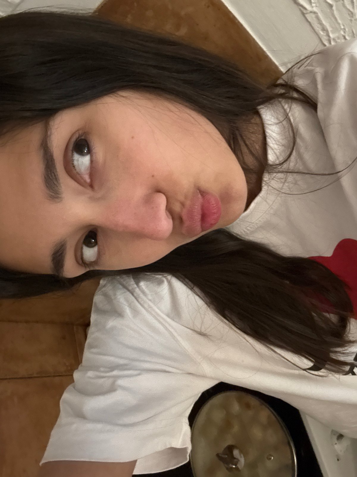 Woman photographed in casual domestic setting in Miljevci, Montenegro