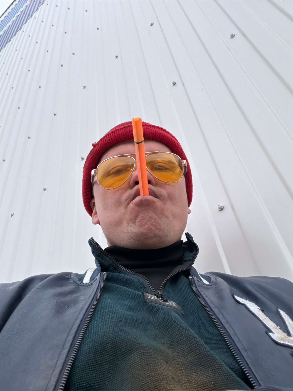 Person in red cap documented around Chaikovsky industrial areas