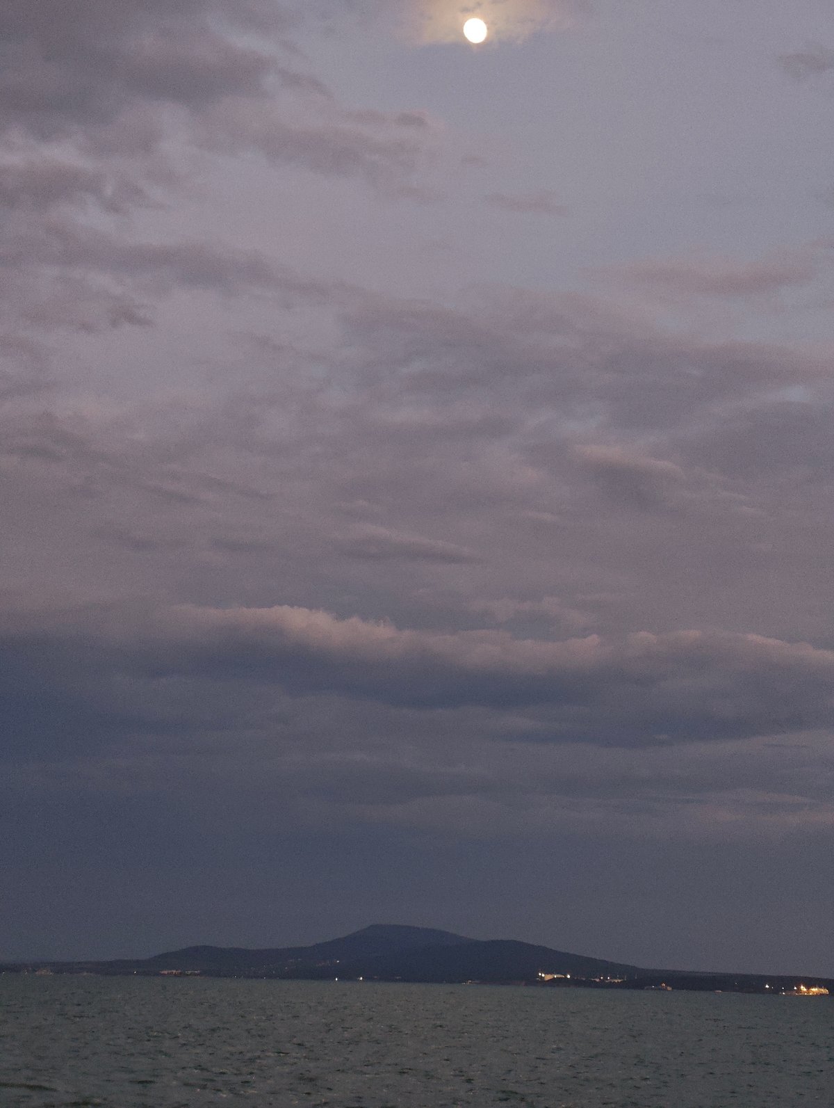 Evening coastal scenes captured along Burgas waterfront during twilight