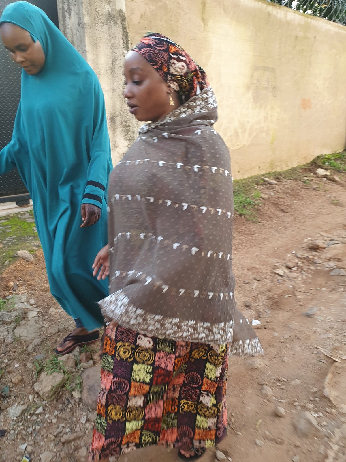 Afternoon street life and a soccer game in Jos, Nigeria