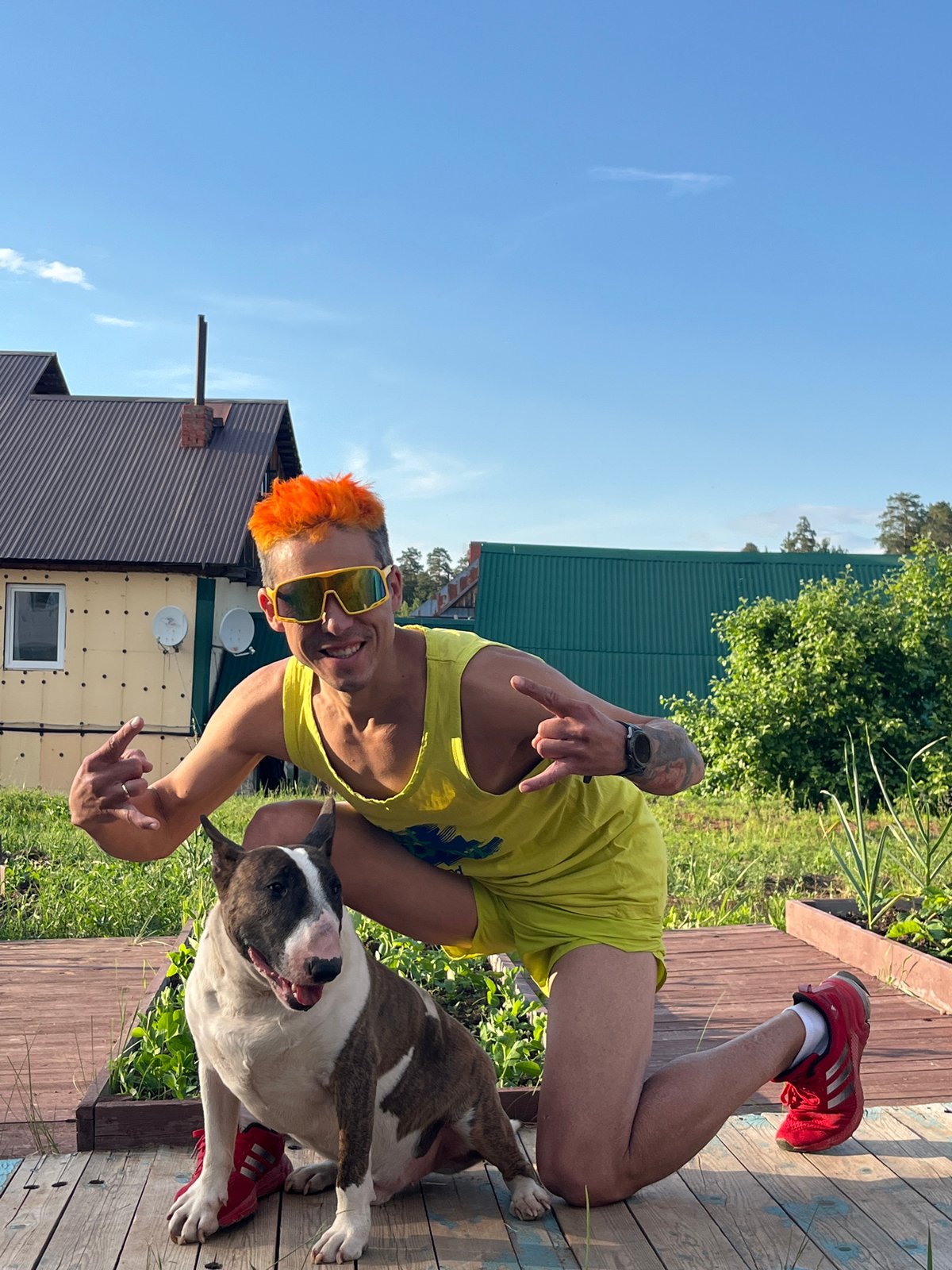 Casual backyard gathering with pets in Chaikovsky, Russia