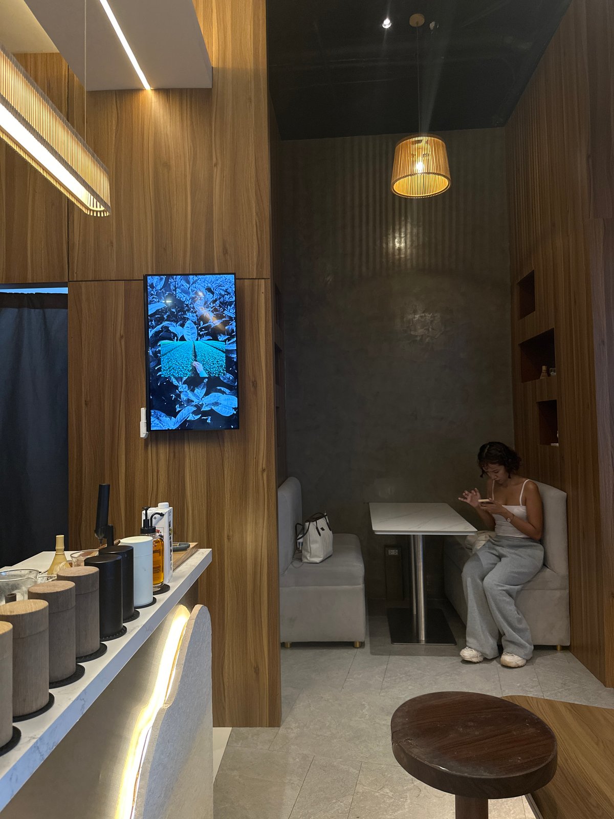 Inside a minimalist wood-and-concrete cafe in Davao City