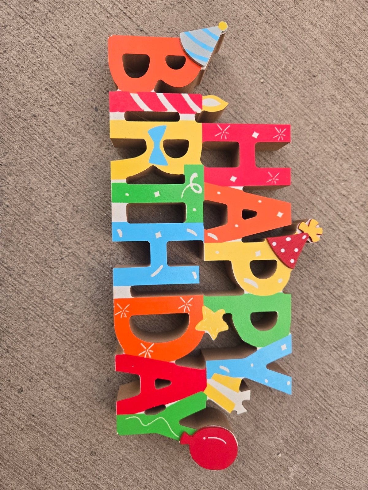 Birthday celebration documented alongside urban street scenes