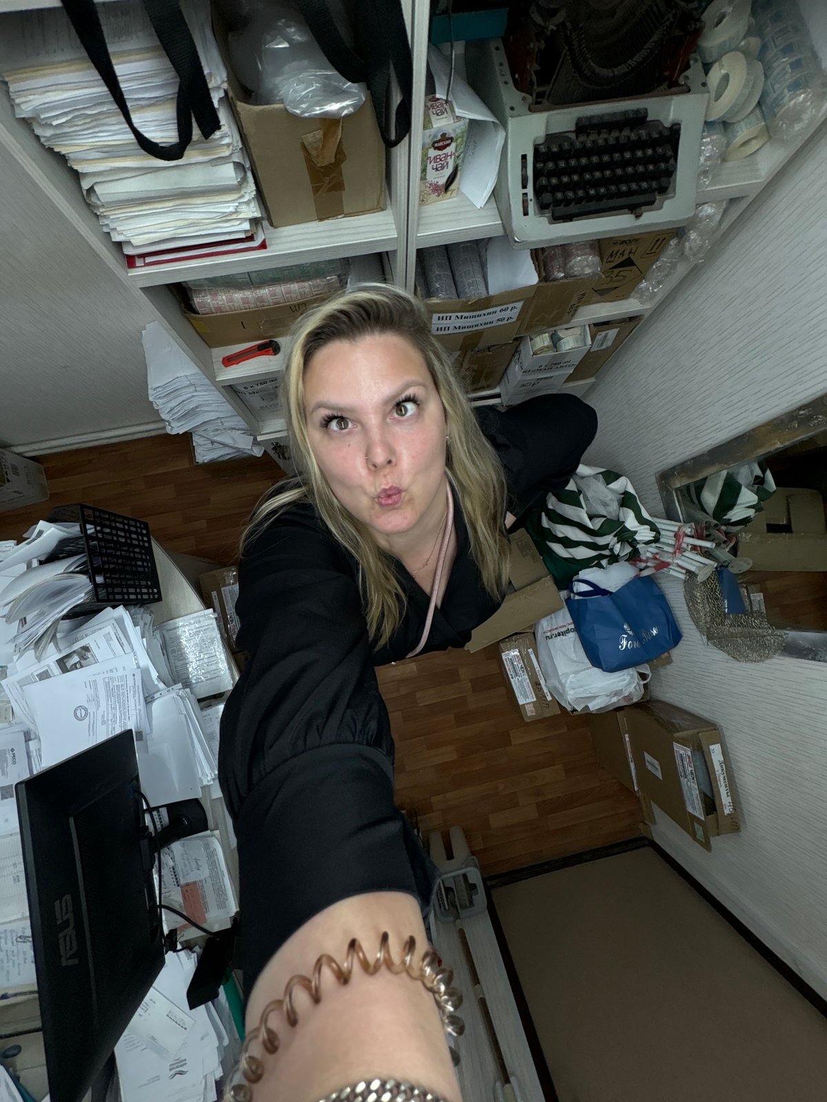 Woman photographed in office and transport settings in Noviy