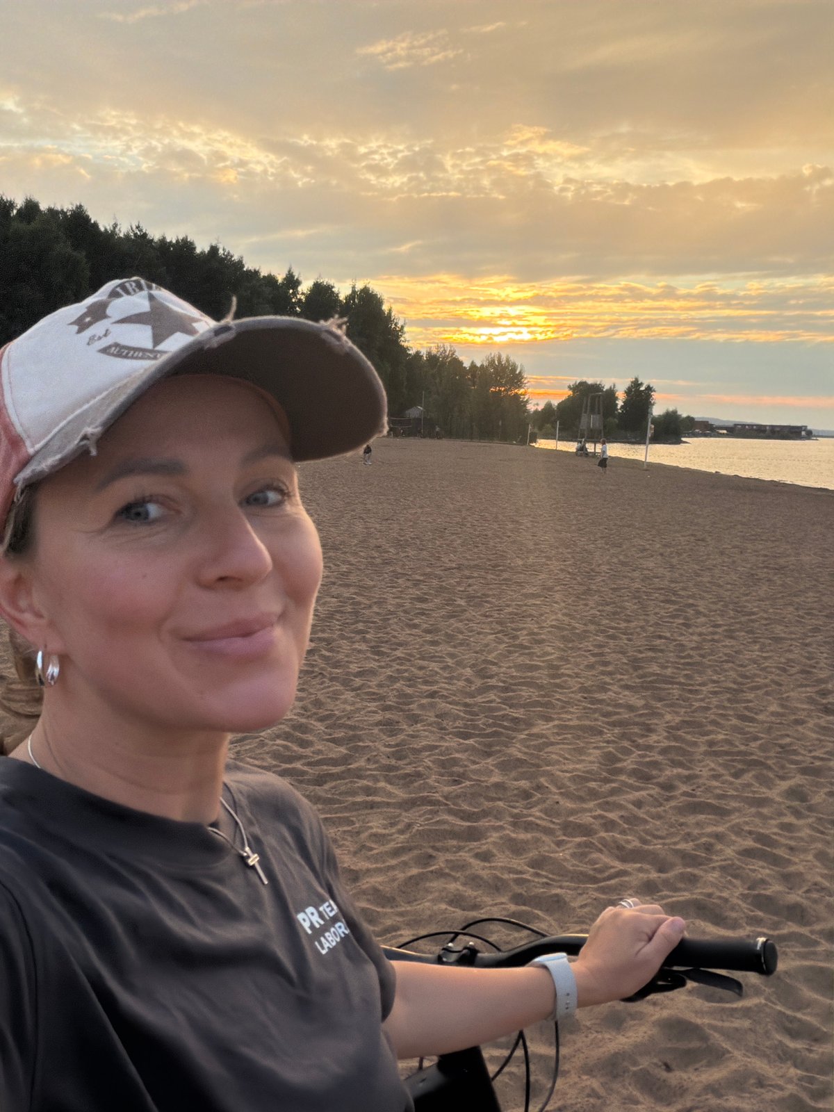 Sunset bike ride along a quiet Chaikovsky beach