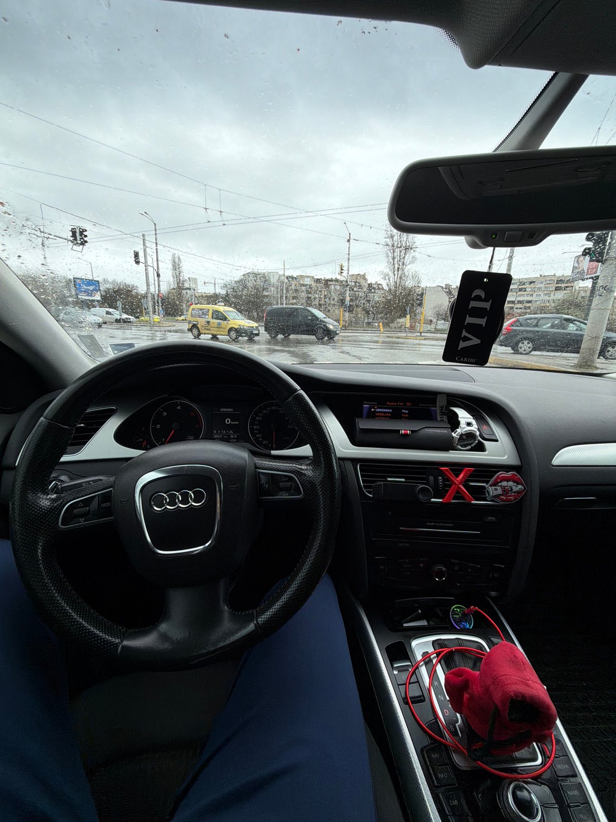 Driver's view of Sofia street from inside Audi vehicle