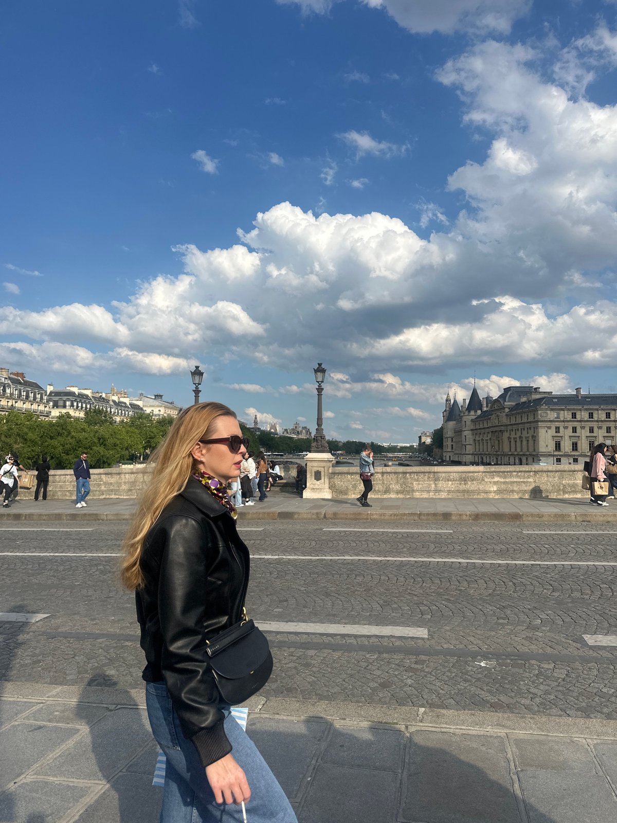 Casual street scenes unfold across central Paris Friday afternoon
