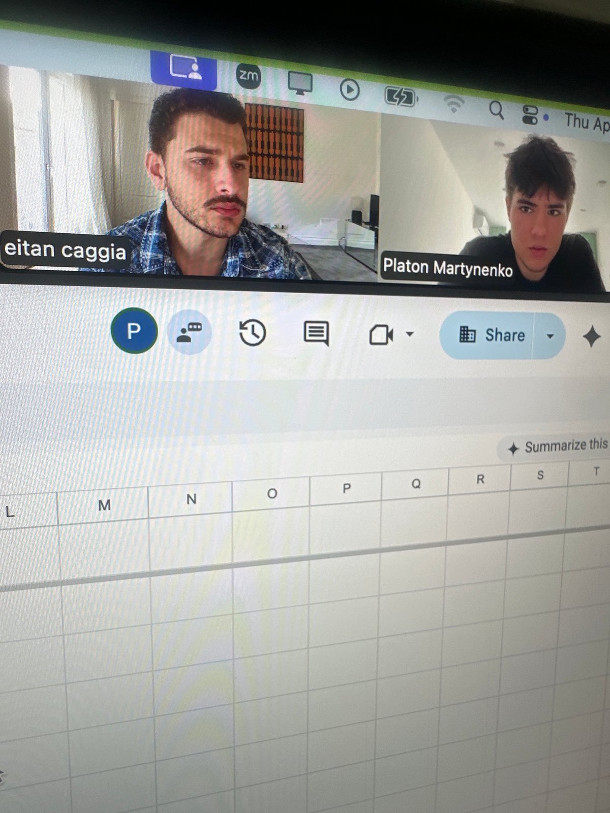 Video conference call captured on computer screen in Milan