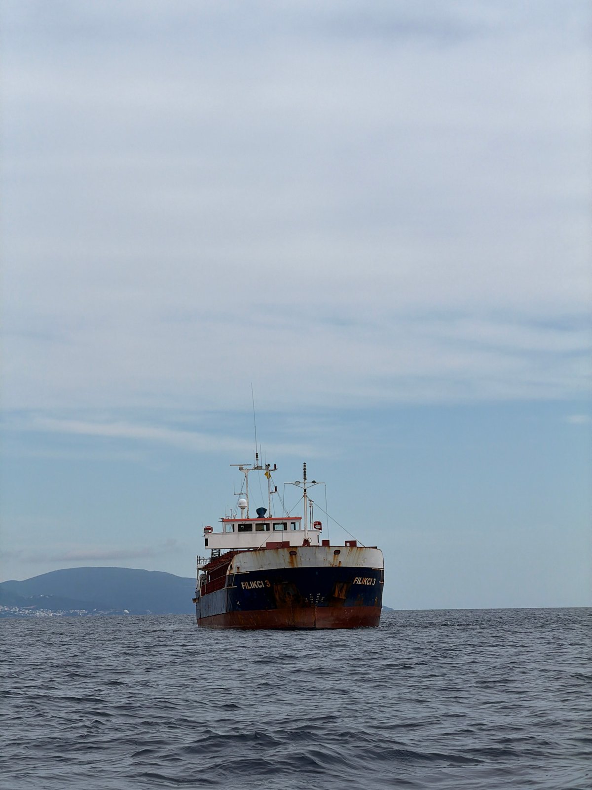 Rusty cargo ship FILIKCI 3 transits the Montenegro coast