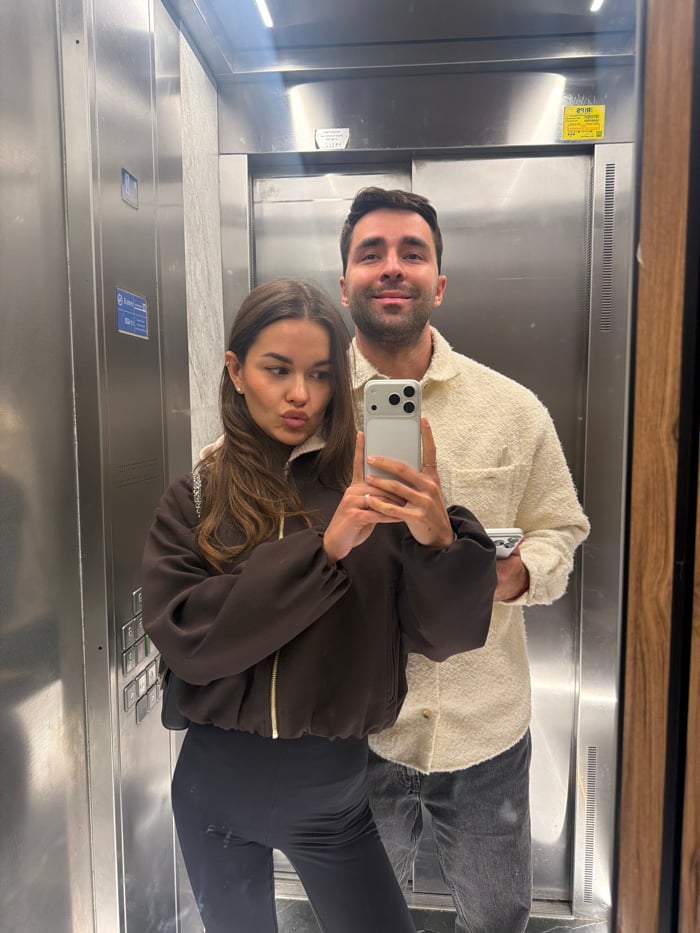 Casual moments captured in Tel Aviv: elevator selfie, dog petting