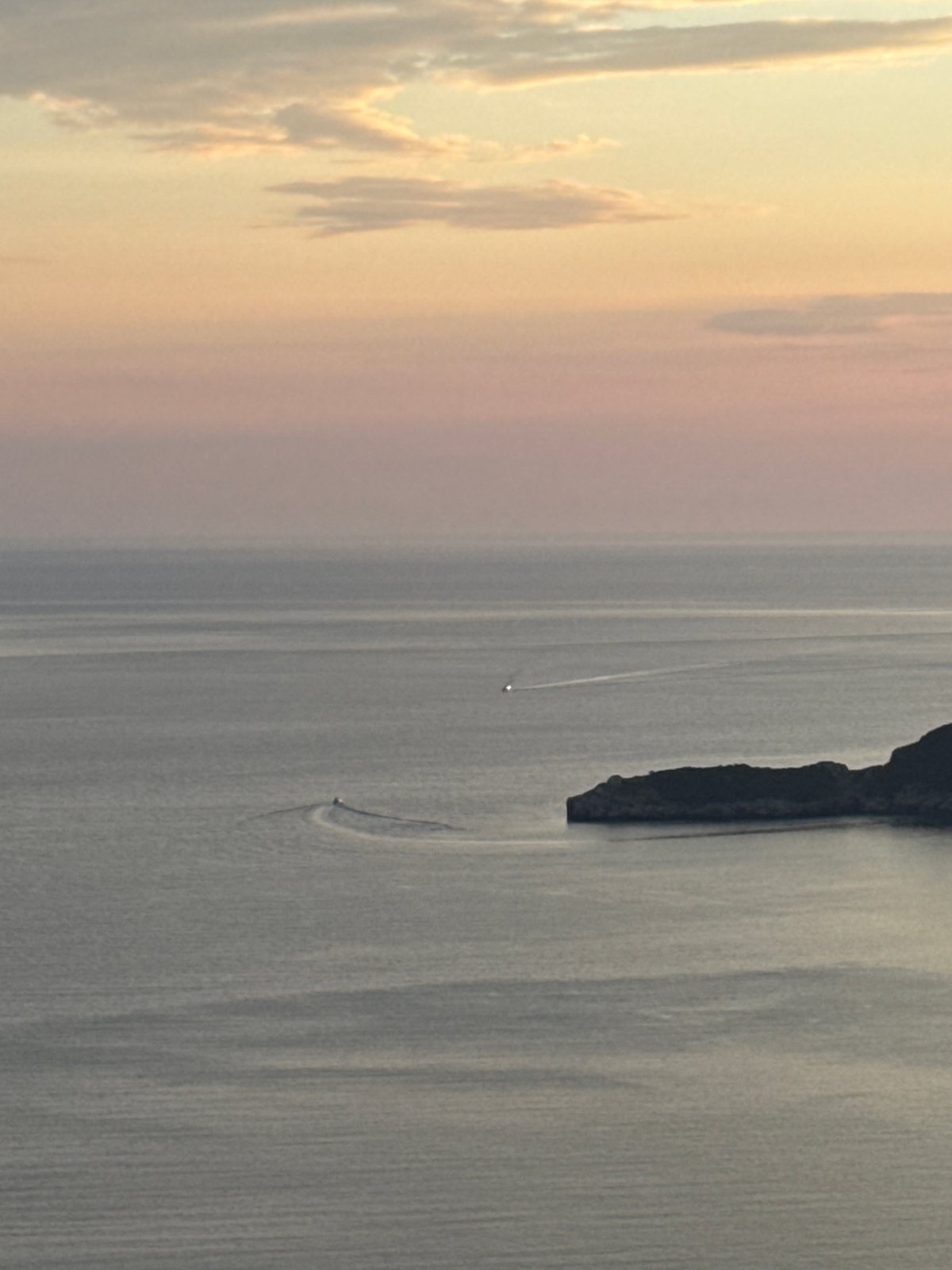 Golden sunset over Montenegro's calm Adriatic coastline
