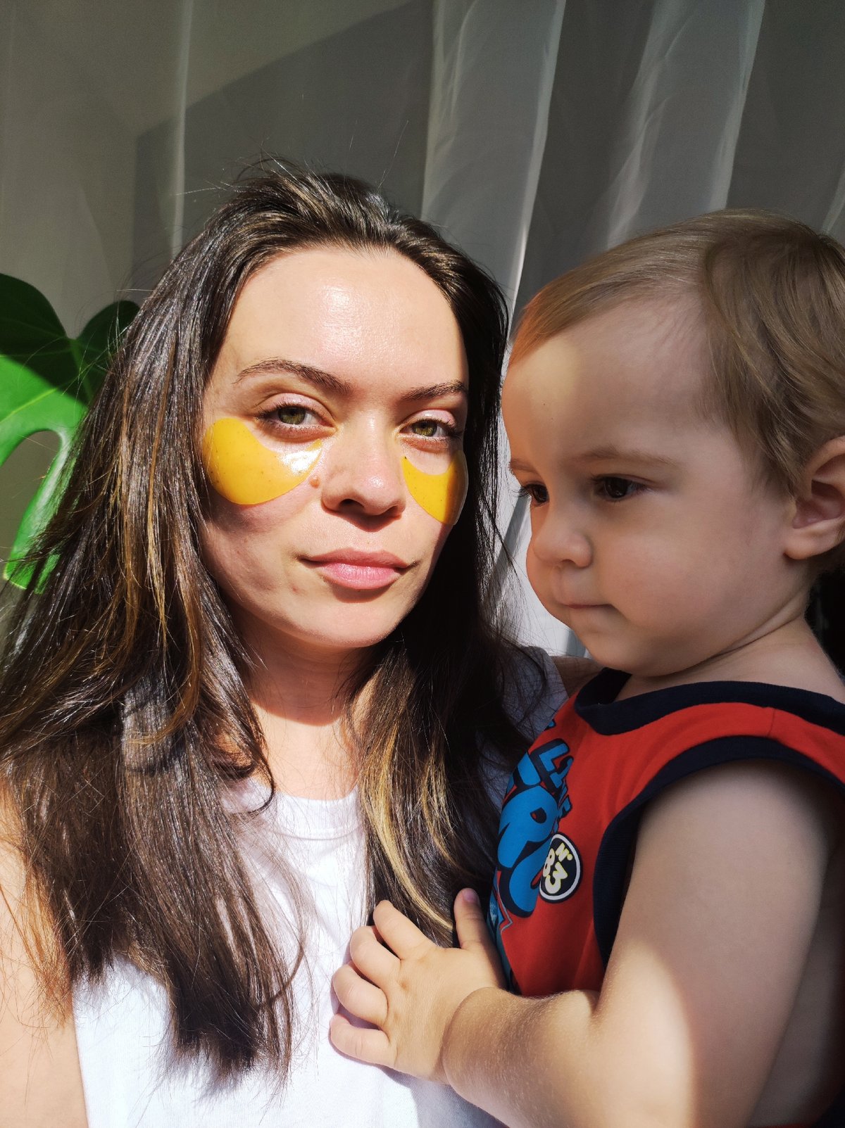 Mother and child share morning skincare routine in Chaikovsky