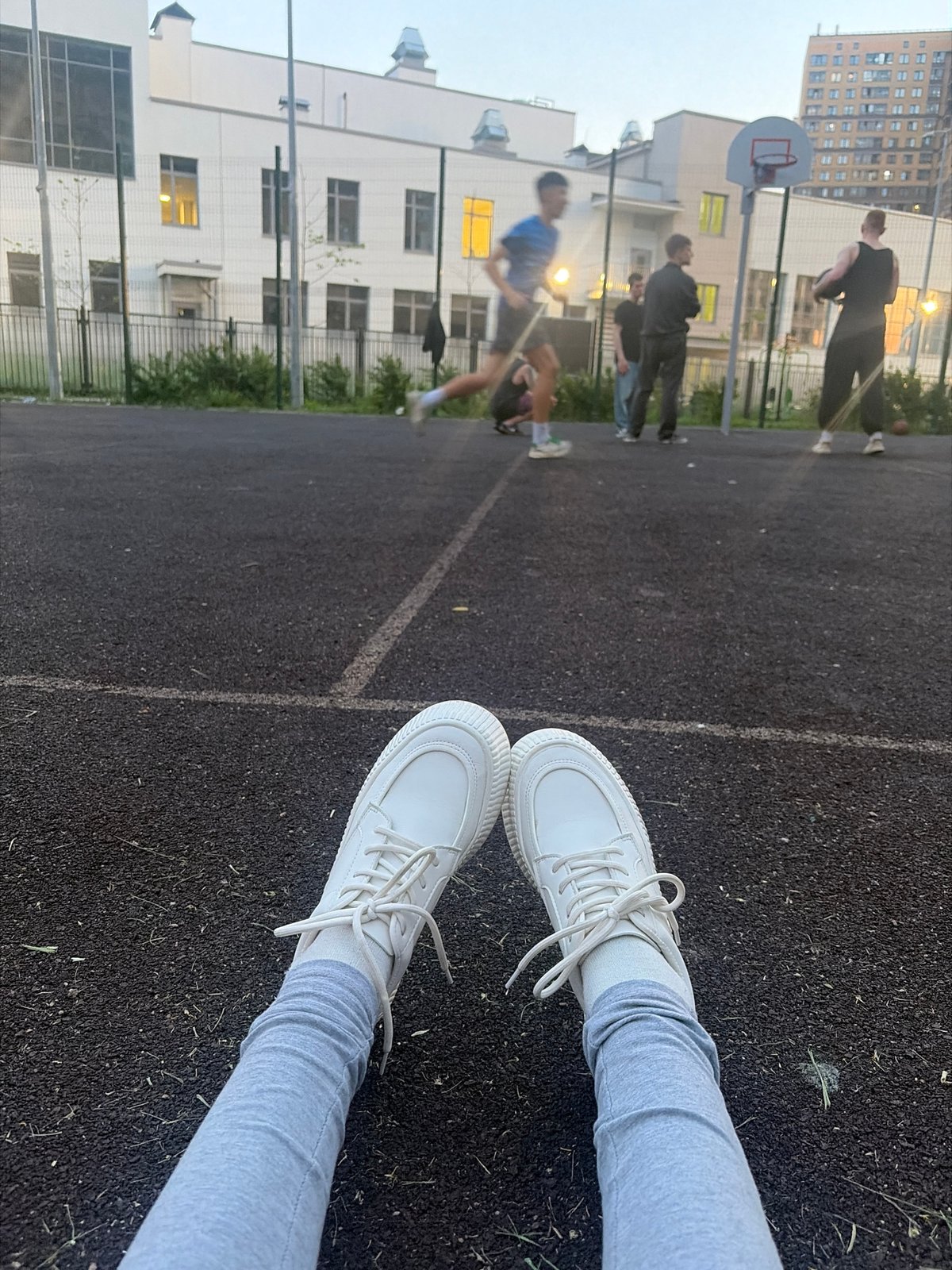 Evening basketball and exercise session in Saint Petersburg residential area