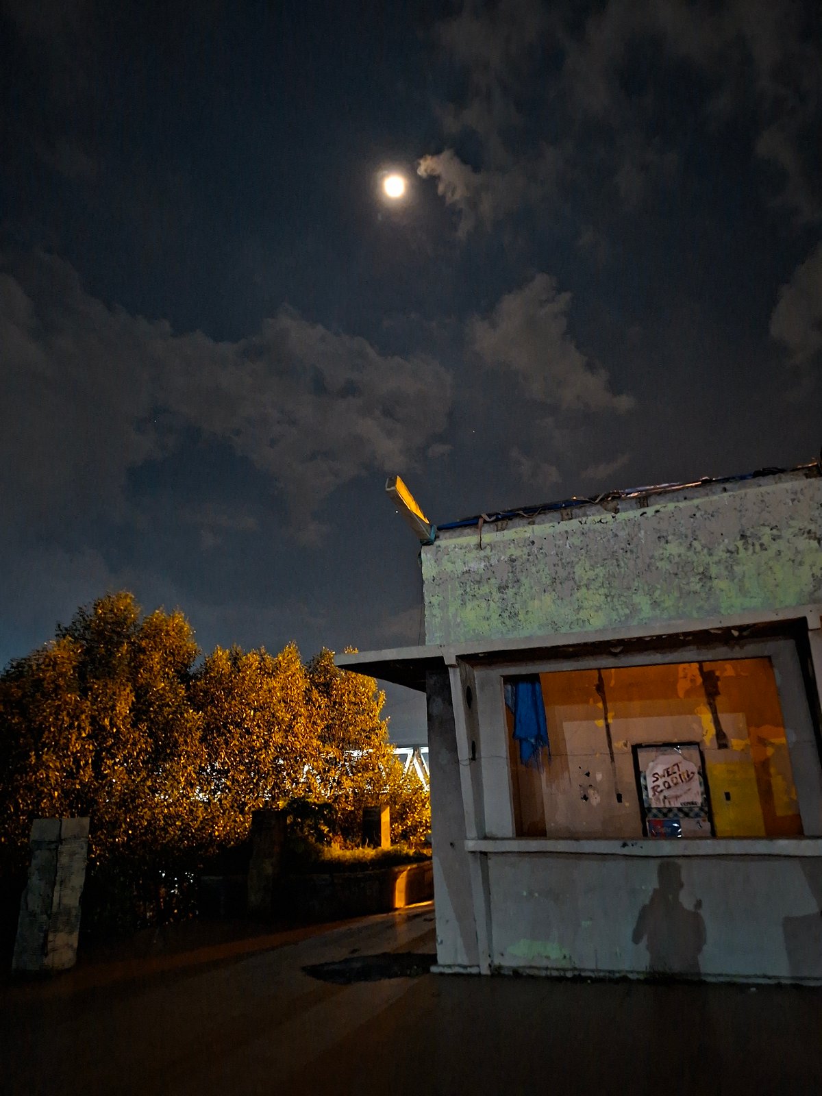 Nighttime scenes documented across Lhokseumawe waterfront and streets