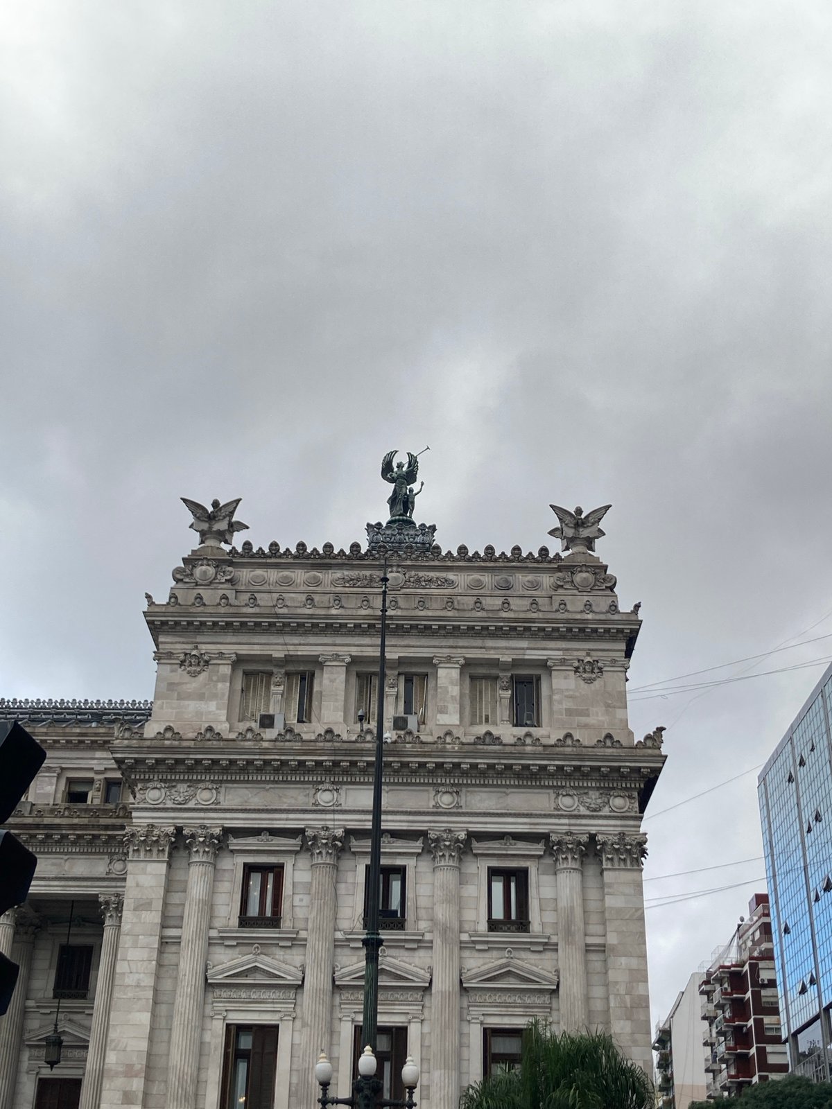 Urban scenes and cheese breads documented during overcast afternoon