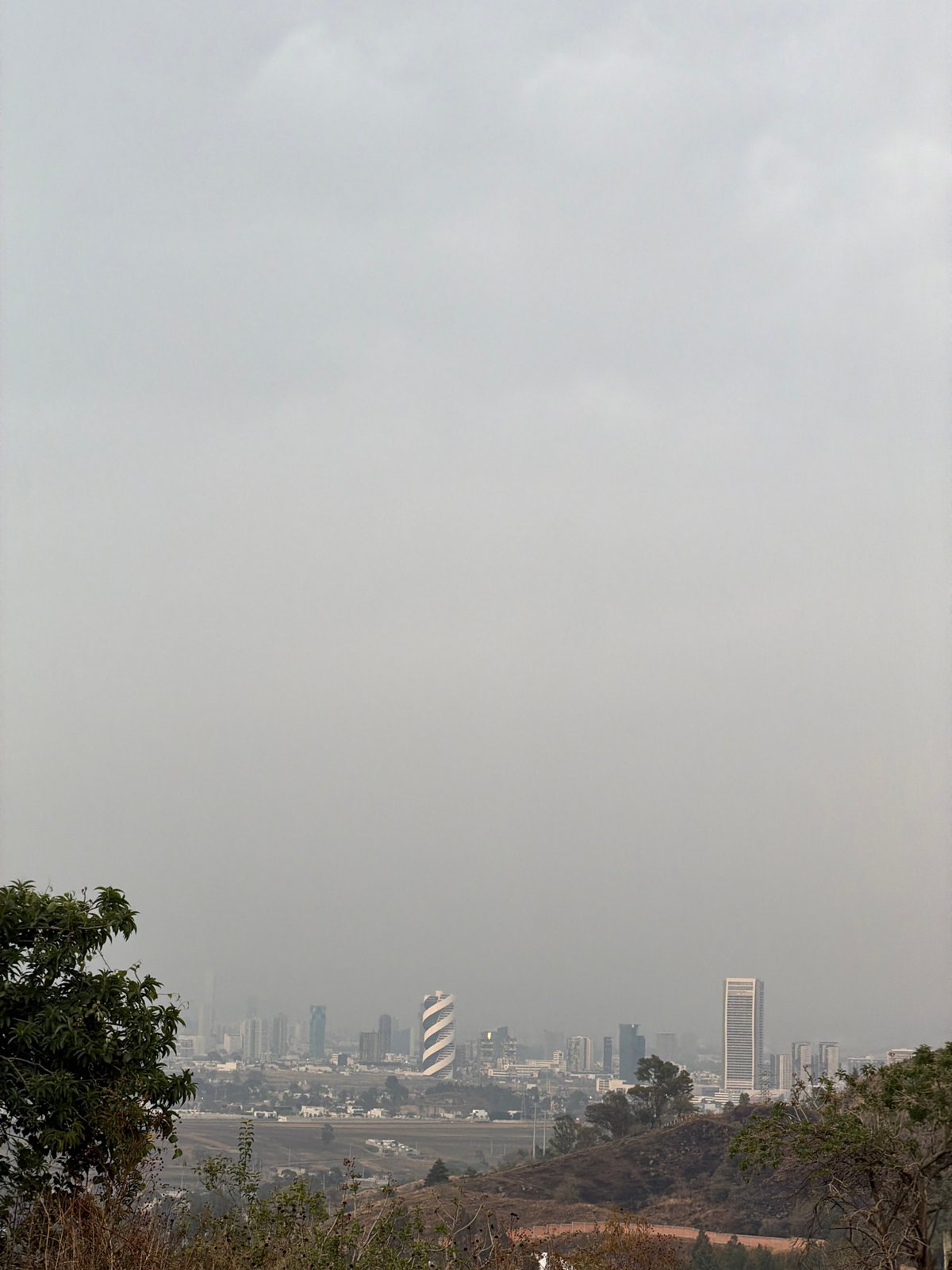 Heavy smog blankets Santa Clara Ocoyucan cityscape overnight