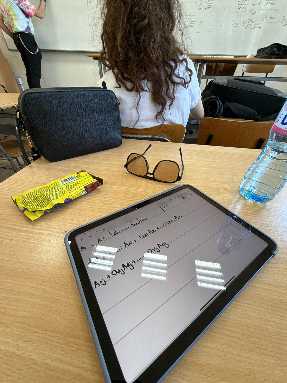 Student studies math equations on tablet in Sofia classroom