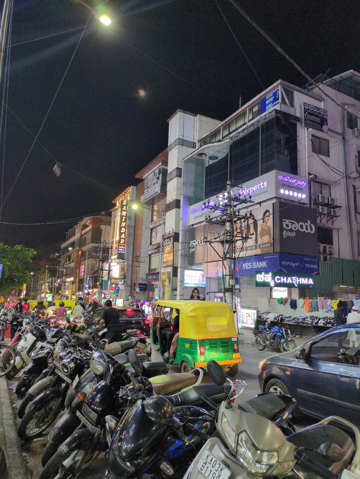 Evening commercial activity documented in busy Bengaluru district