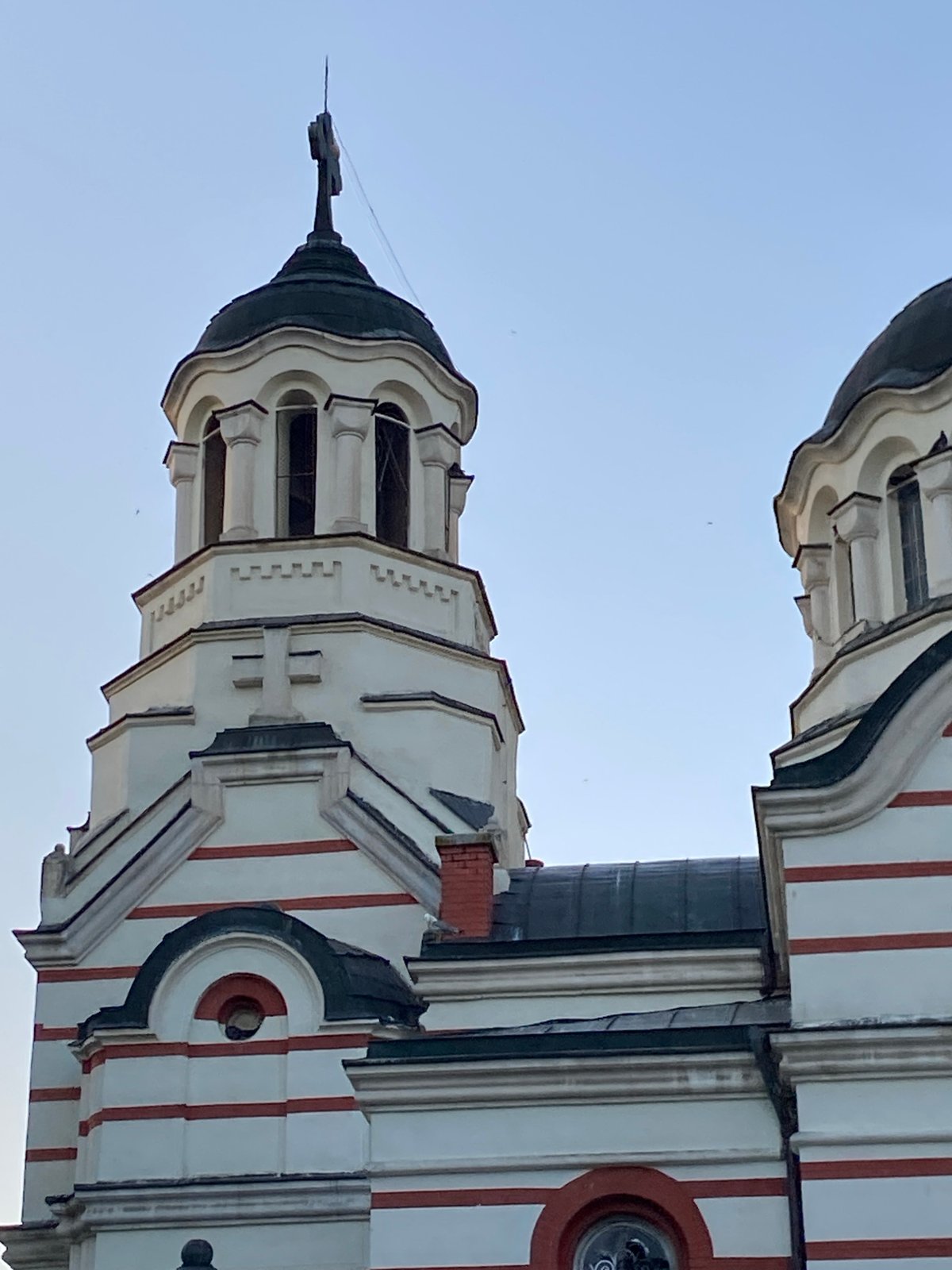 Red-and-white striped Orthodox church dominates Varna's urban streetscape