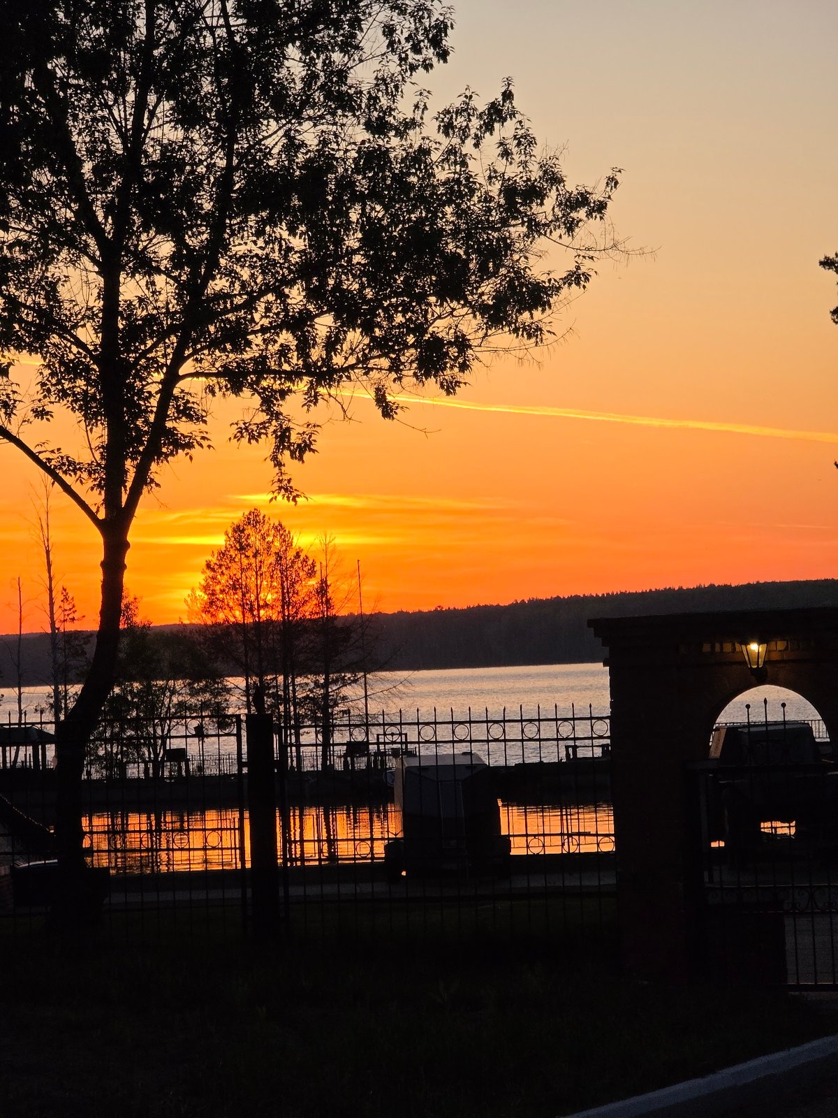 Sunset observed over water in Chaikovsky, Russia