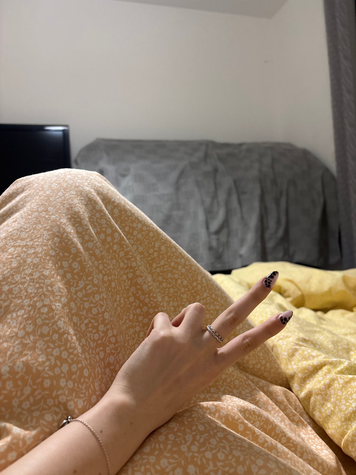 Peace sign gesture observed in Sofia with decorative nails