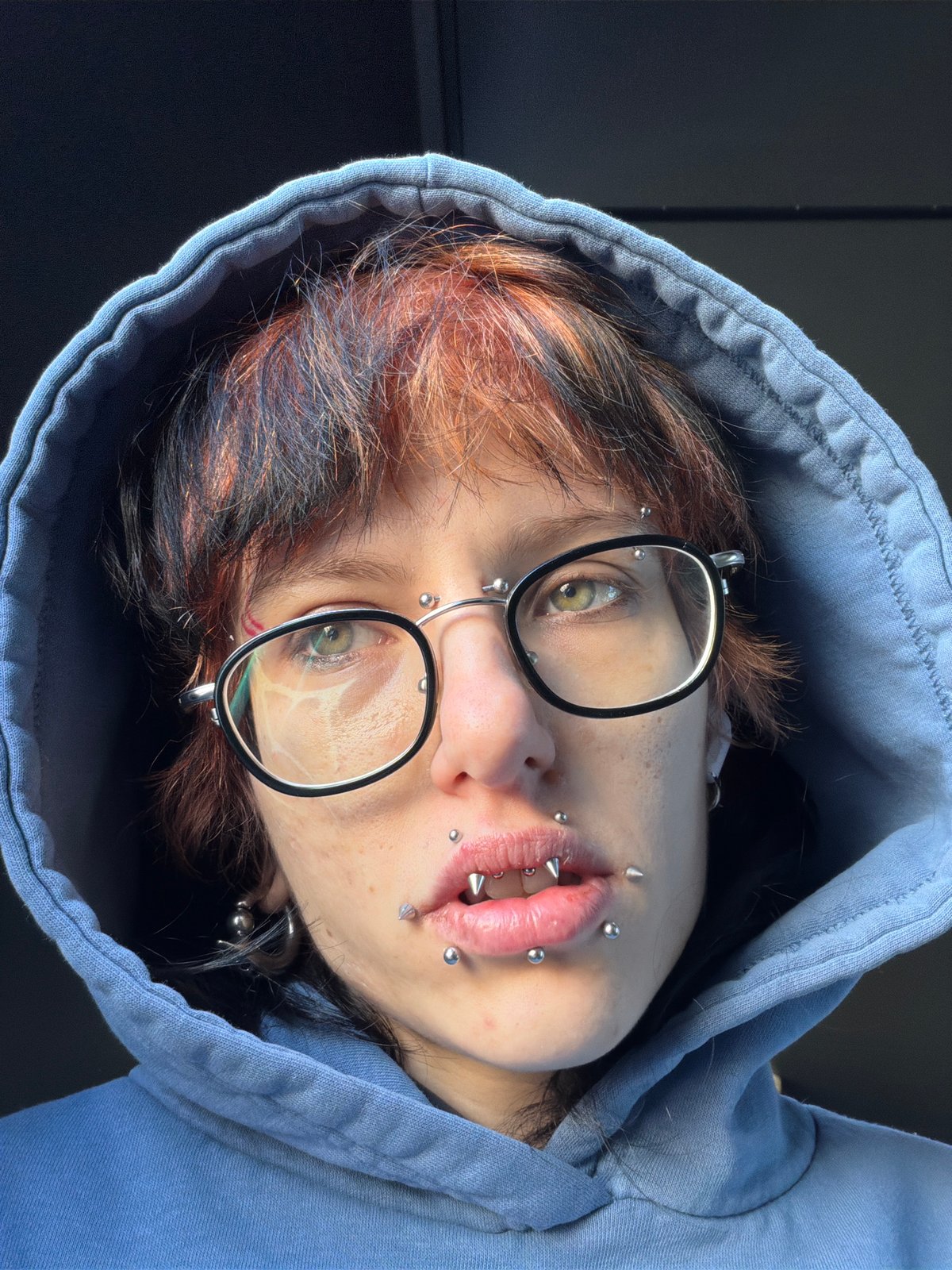 Portrait of person in blue hoodie captured in Sofia