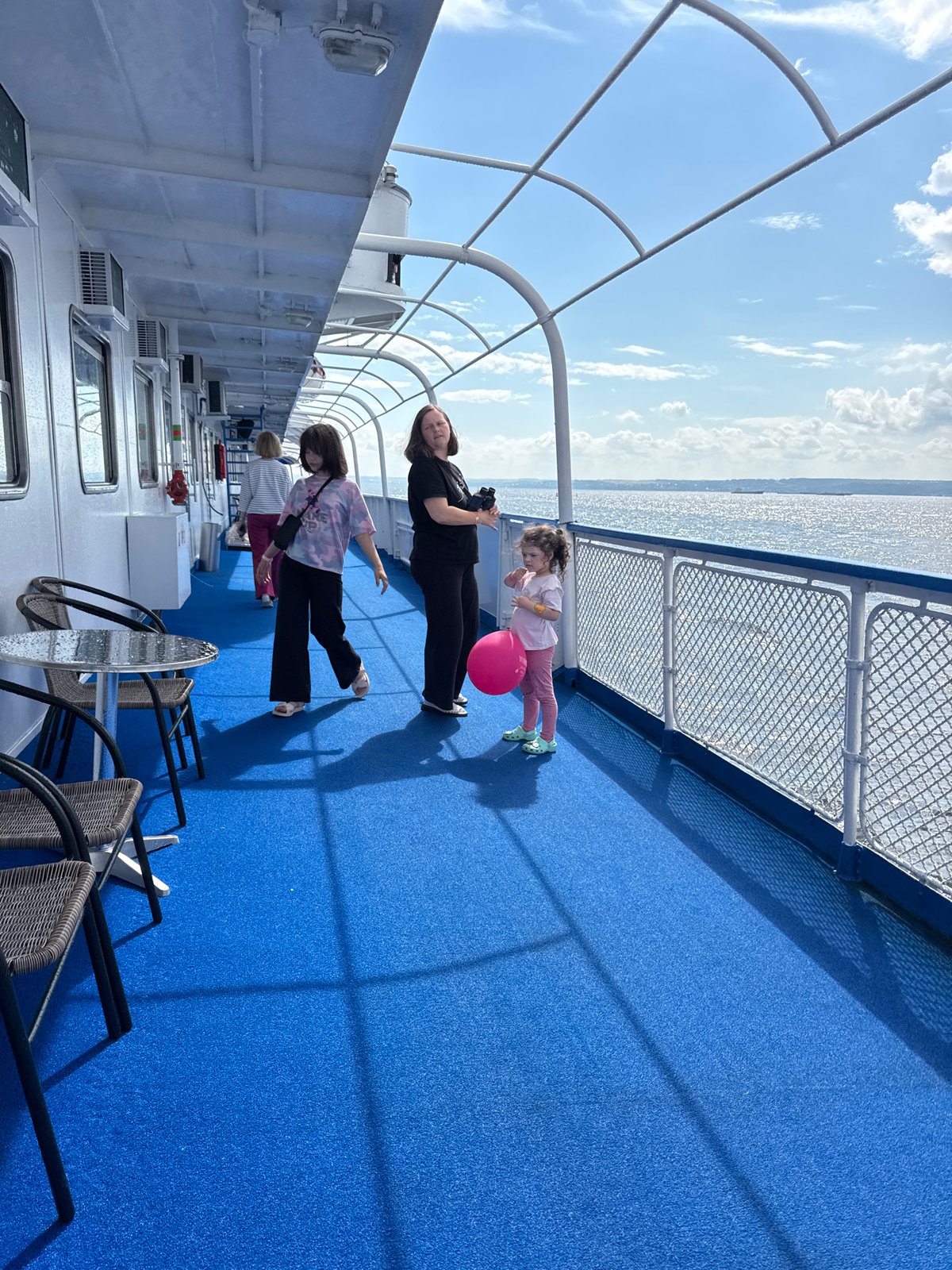 Ferry deck scenes overlooking a Russian city skyline