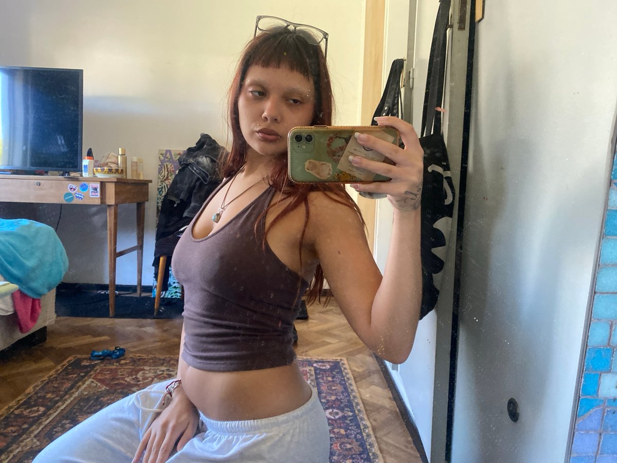 Mirror selfies captured in Buenos Aires indoor setting