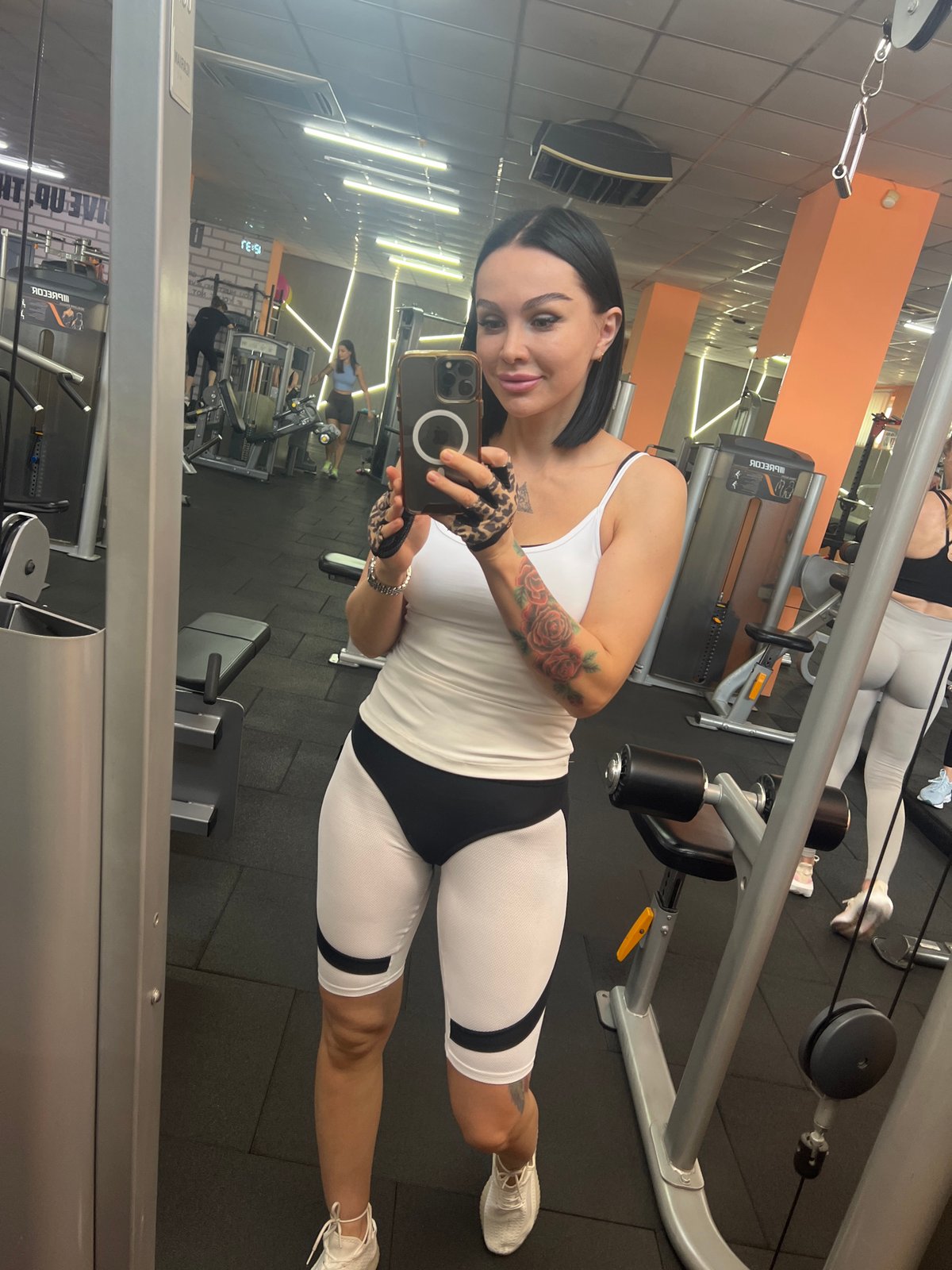 Multiple angles of a busy gym workout session