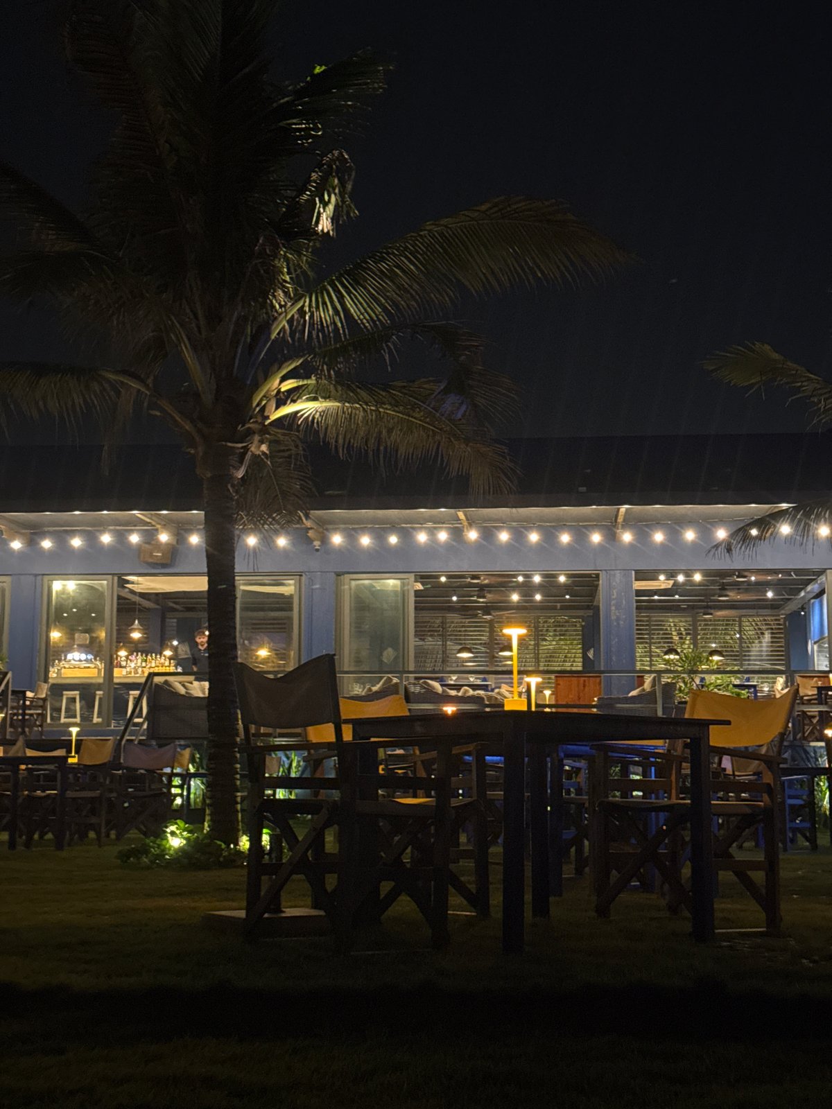 Casual moments captured in Đà Nẵng featuring nighttime building, DJ selfie