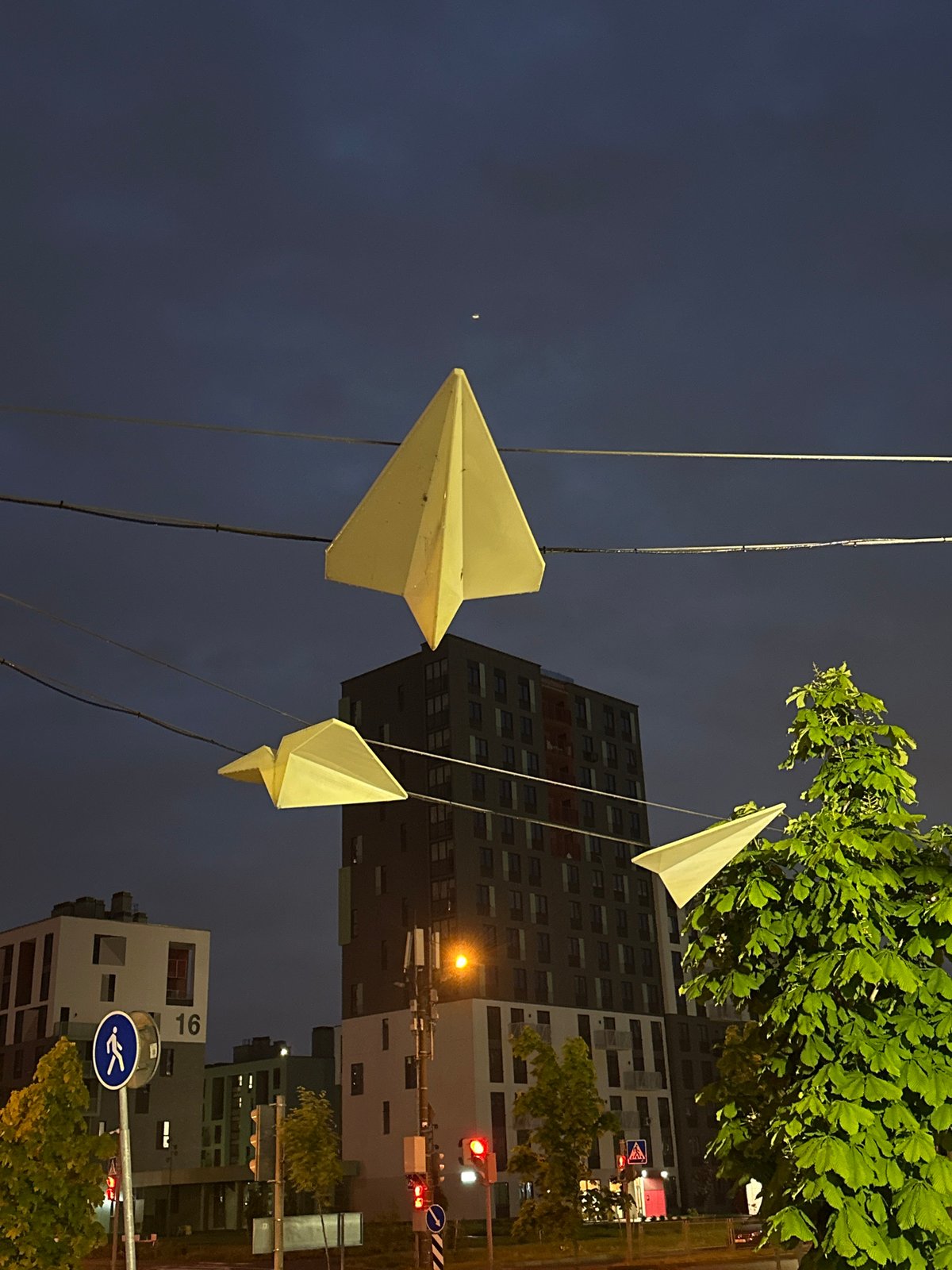 Evening documentation of modern Belarus neighborhood with public art